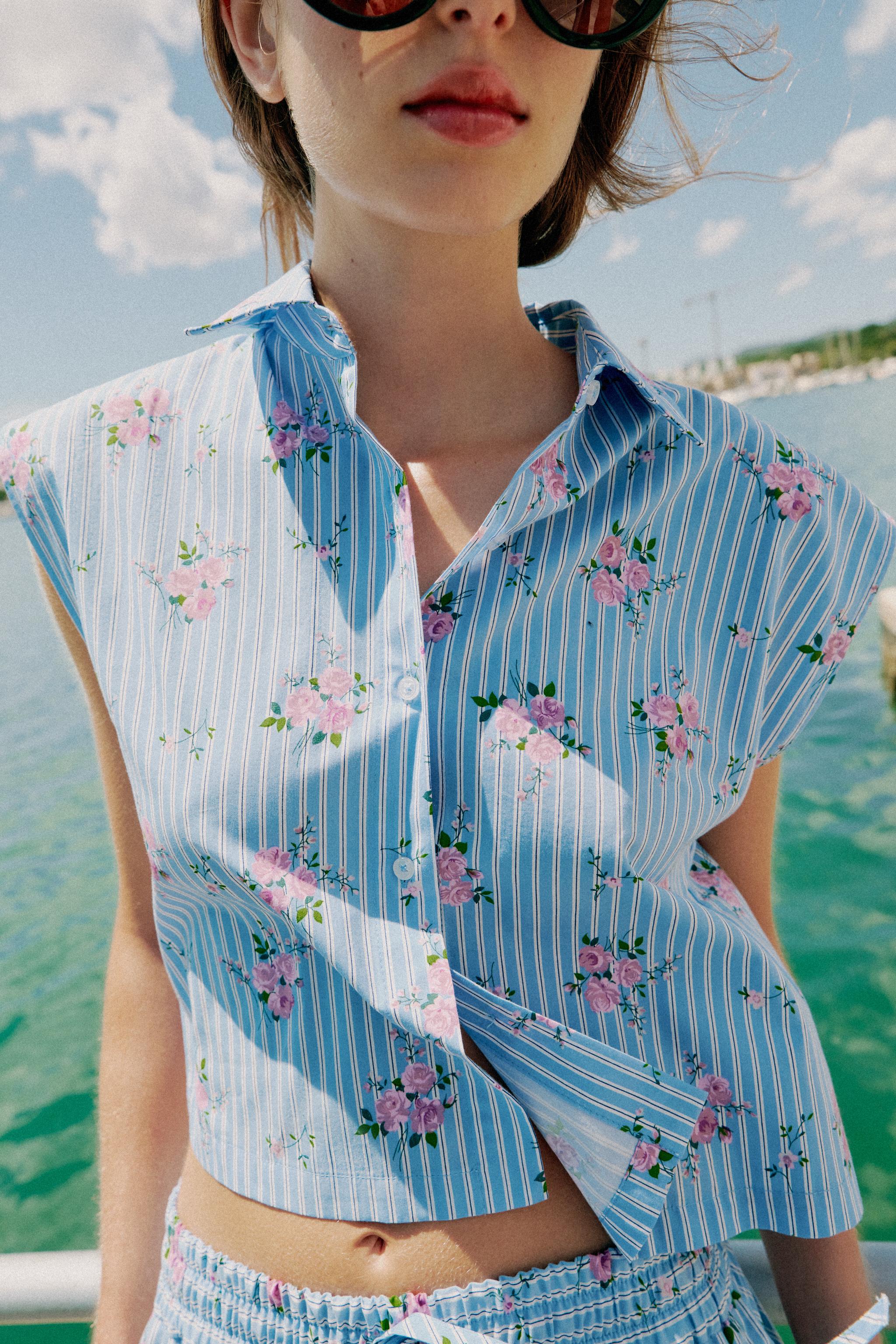 STRIPED SLEEVELESS SHIRT